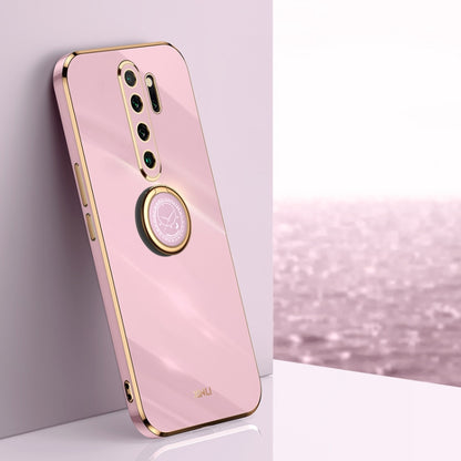 Pink TPU phone case with ring holder and gold-toned trim; visible camera cutouts
