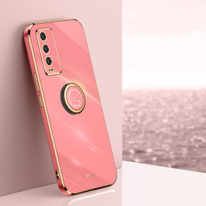Coral pink electroplate TPU phone case with ring holder and gold-edged camera cutout.