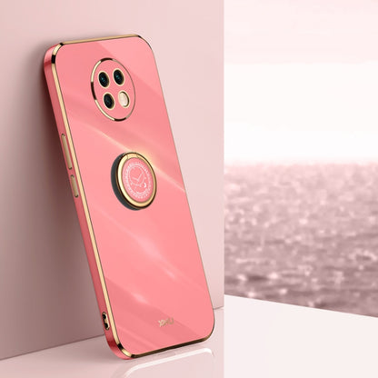 Coral pink TPU phone case with electroplate-look trim and built-in ring holder