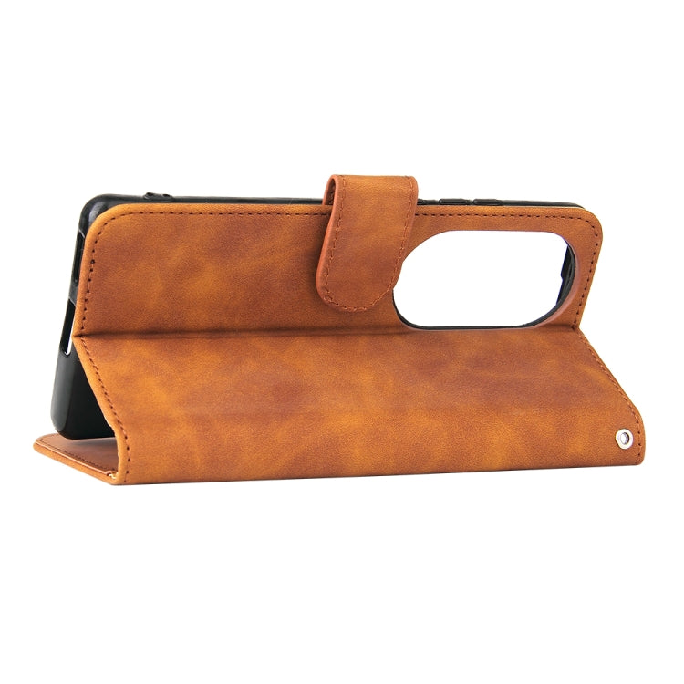 Brown PU leather stand flip phone case with cutout hand strap and fold support