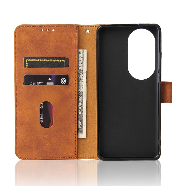Brown PU leather flip phone case with card slots and phone back insert; cut camera opening