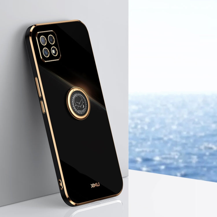 Black TPU phone case with gold ring holder and camera cutouts