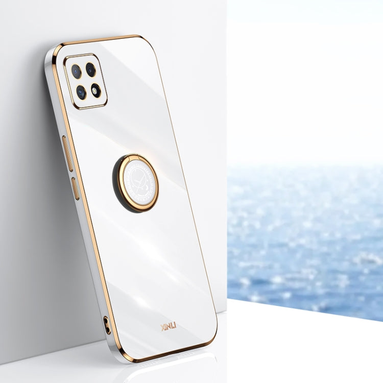White TPU phone case with gold ring holder and side camera openings