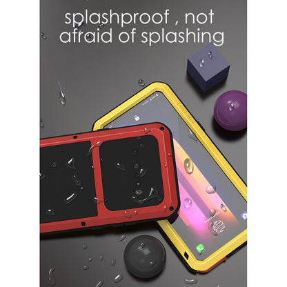 Waterproof rugged phone case in yellow with red accents and tempered glass front