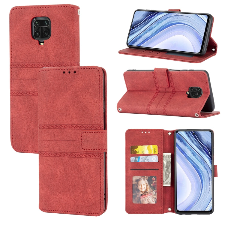 Red magnetic flip phone wallet case with card slots, photo window, and landscape stand view.