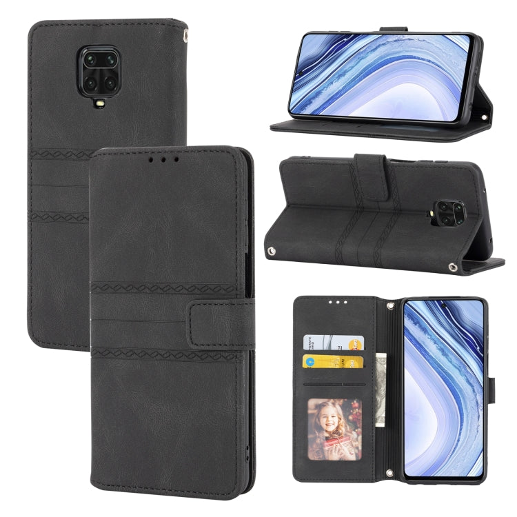 Dark black magnetic flip phone wallet case with card slots and photo window, landscape stand.