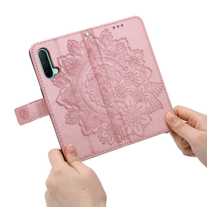 Rose gold floral embossed PU leather phone wallet case with built-in card slots and strap