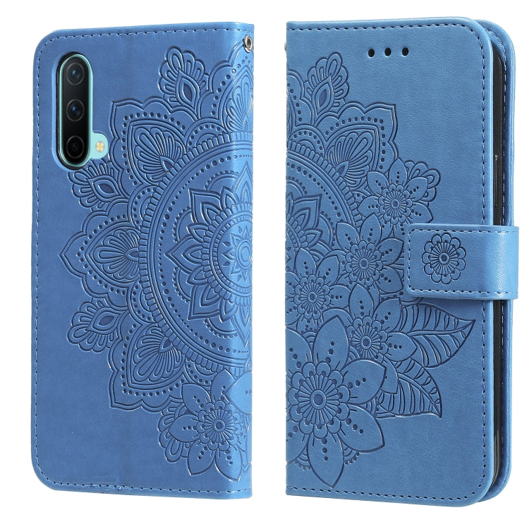 Blue embossed floral PU leather flip phone case with card slots and holder strap