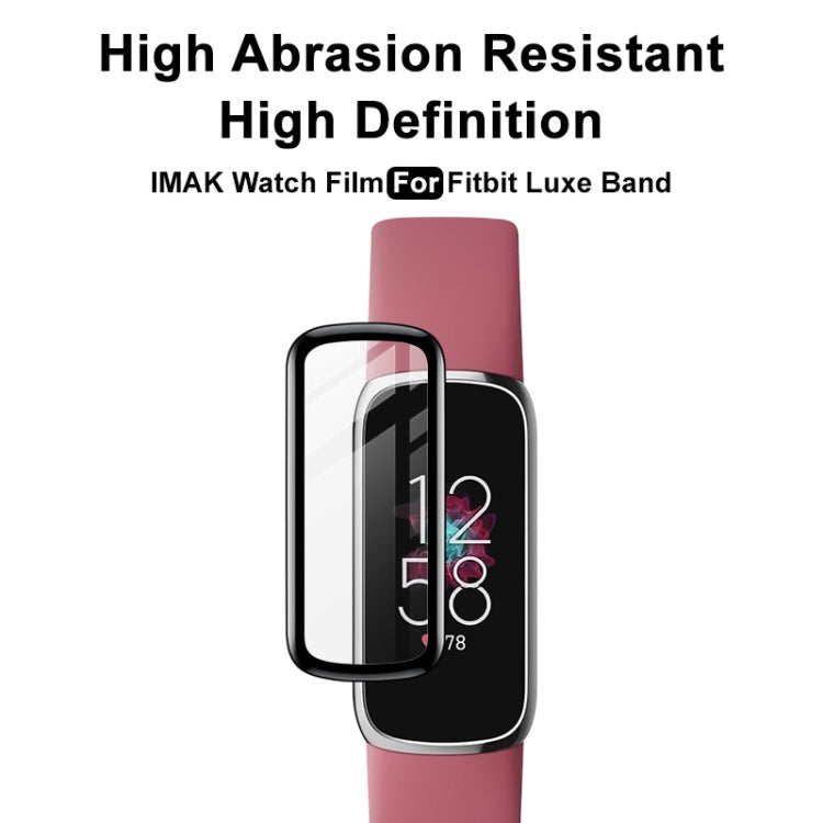 Clear curved watch screen protector film on a pink fitness tracker.