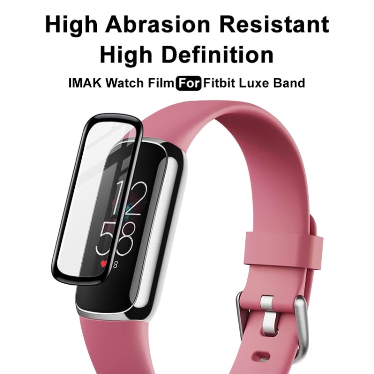 Watch screen protector film installed on a pink band; side angle view.