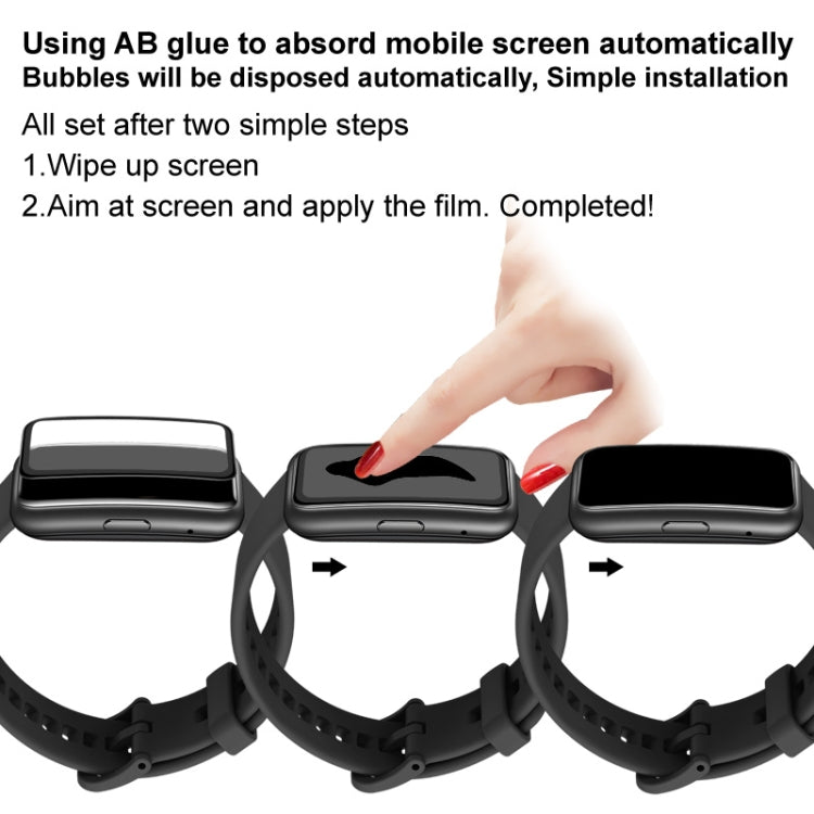 Hand applying a clear watch screen protector film to a smartwatch band.