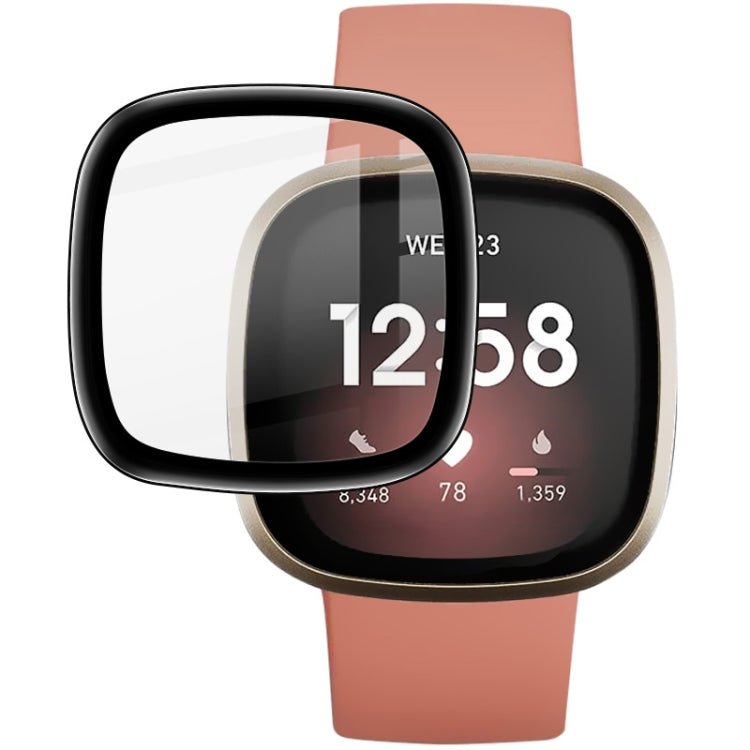 Close-up of clear watch screen protector film on a pink smartwatch display.
