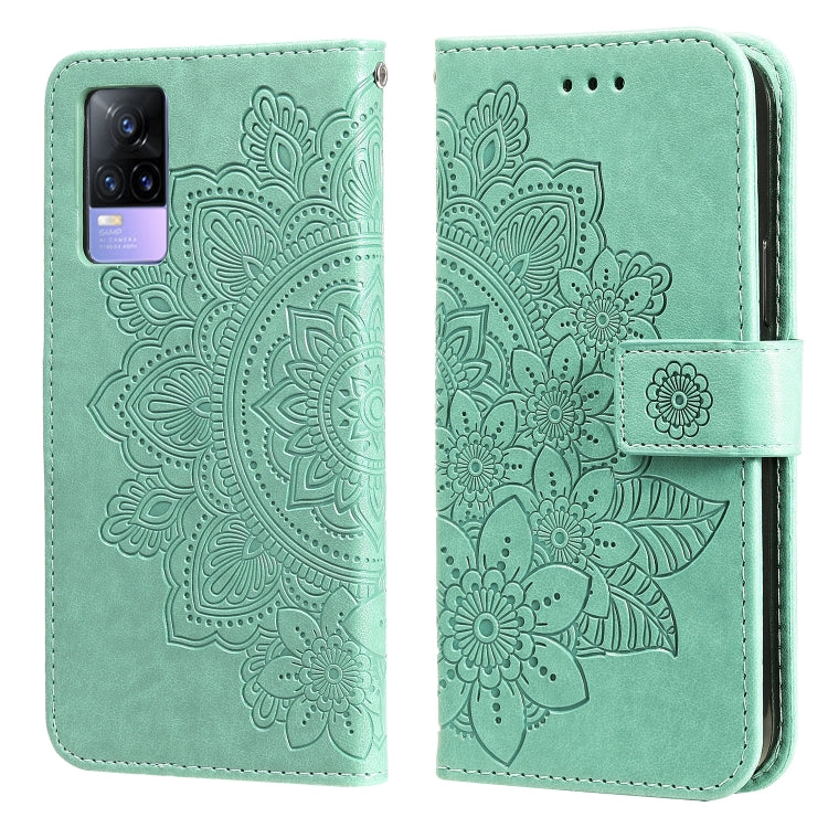 Mint green embossed floral wallet phone case with card slots and magnetic strap