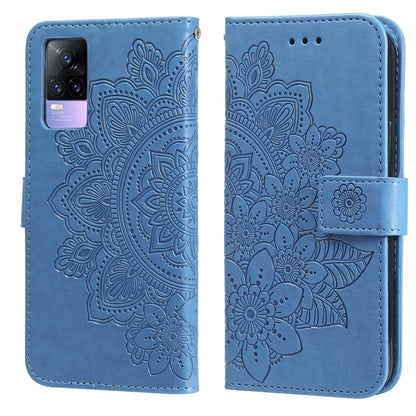 Blue embossed floral folio phone case with card slots and magnetic front strap