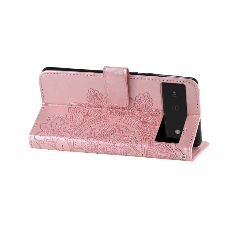 Rose gold PU leather flip phone case with embossed floral pattern and front magnetic strap