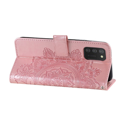 Rose gold PU leather flip phone wallet case with embossed floral design and closure band.