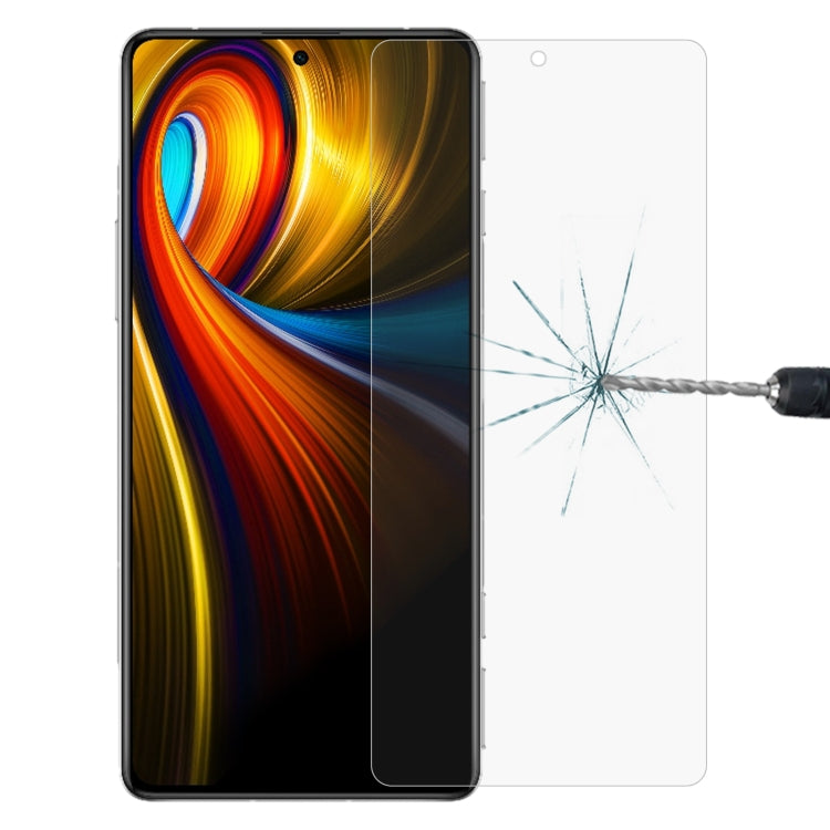 Clear tempered glass screen protector film on phone screen with crack resistance