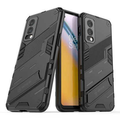 Black shockproof phone case with kickstand; rugged texture and camera cutouts.
