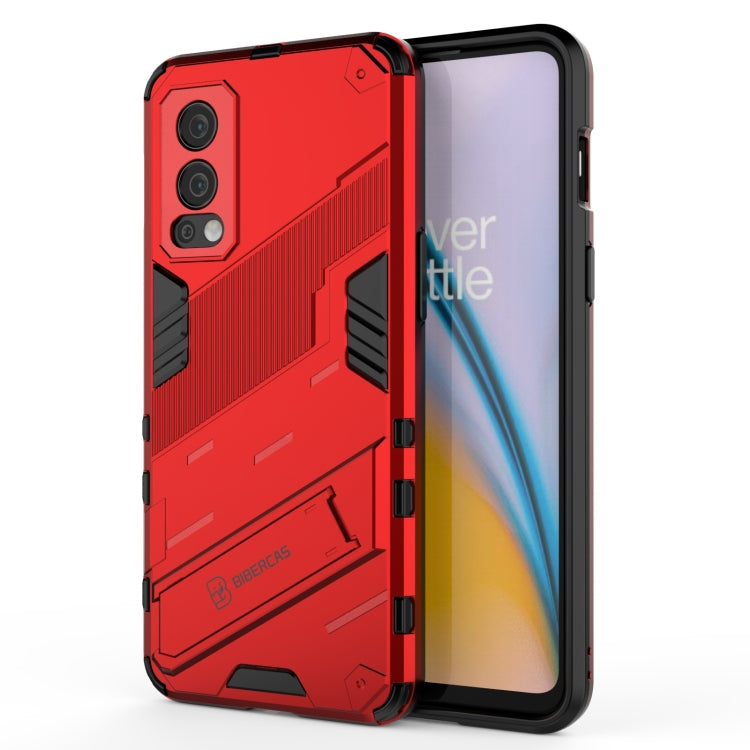 Red shockproof phone case with kickstand and raised camera guard; TPU shell.