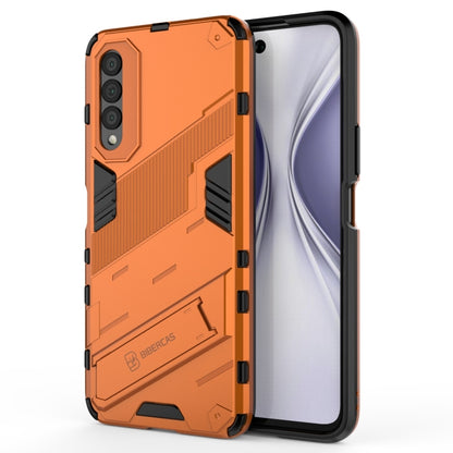 Orange shockproof phone case, armored 2-layer protection with textured panels and bumper