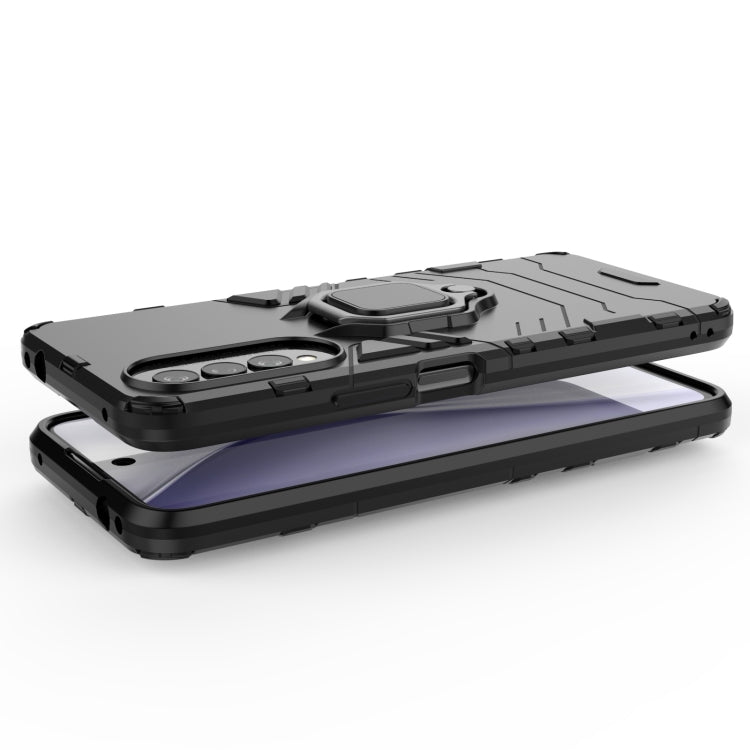 Black shockproof phone case with magnetic ring holder, shown on front and back
