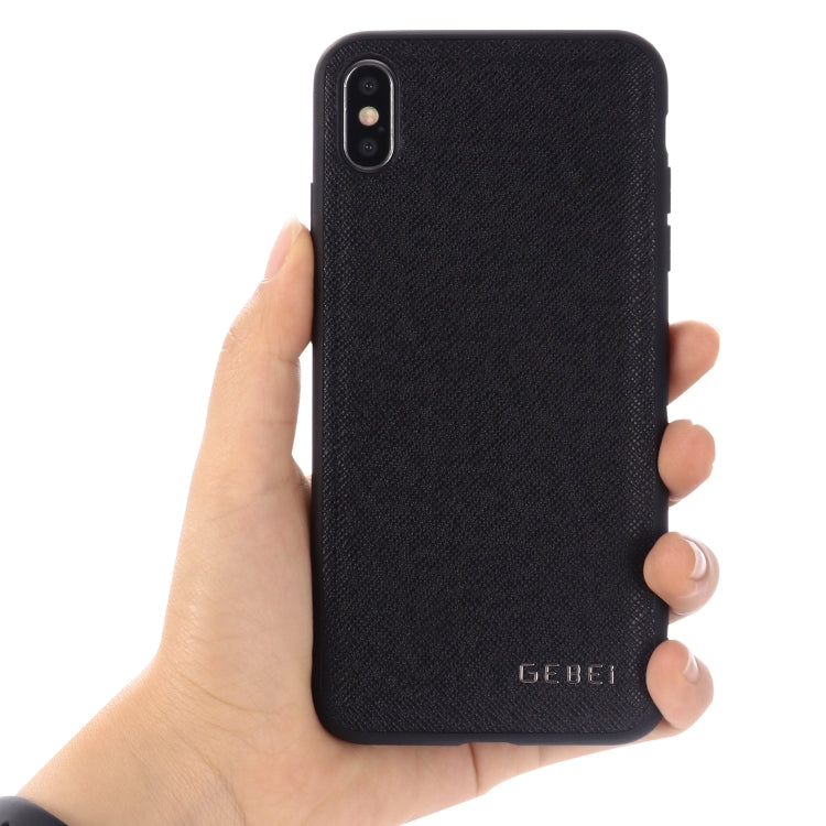 GEBEI textured black leather phone case held in hand, back view