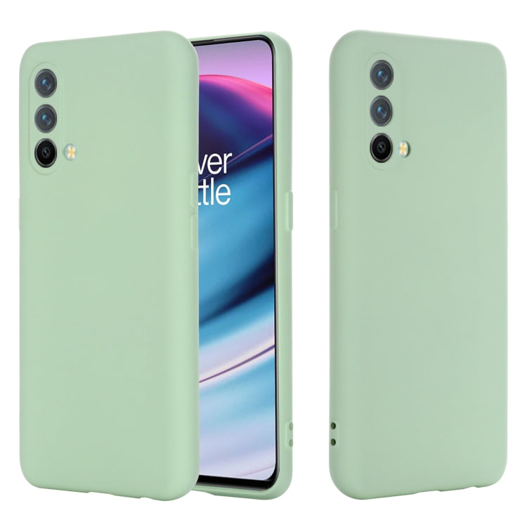 Green silicone phone case, shockproof full-coverage back with camera cutouts.