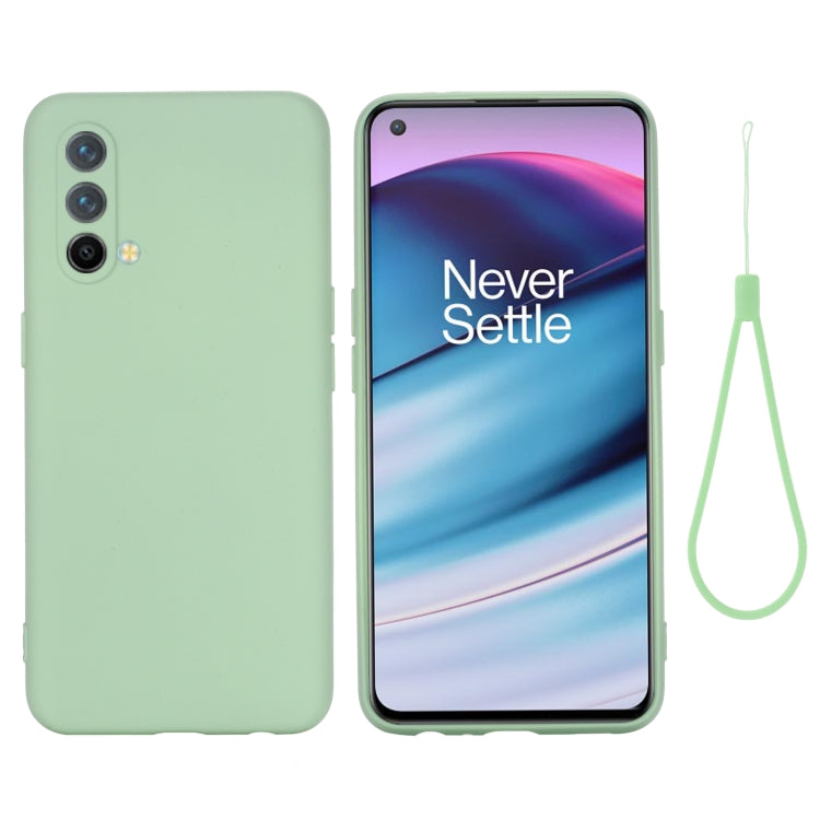 Green silicone phone case with camera cutouts and included lanyard strap.