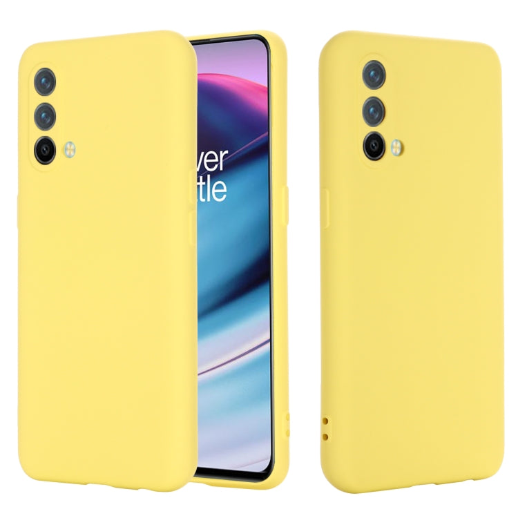 Yellow silicone phone case, shockproof full-coverage back with camera cutouts.