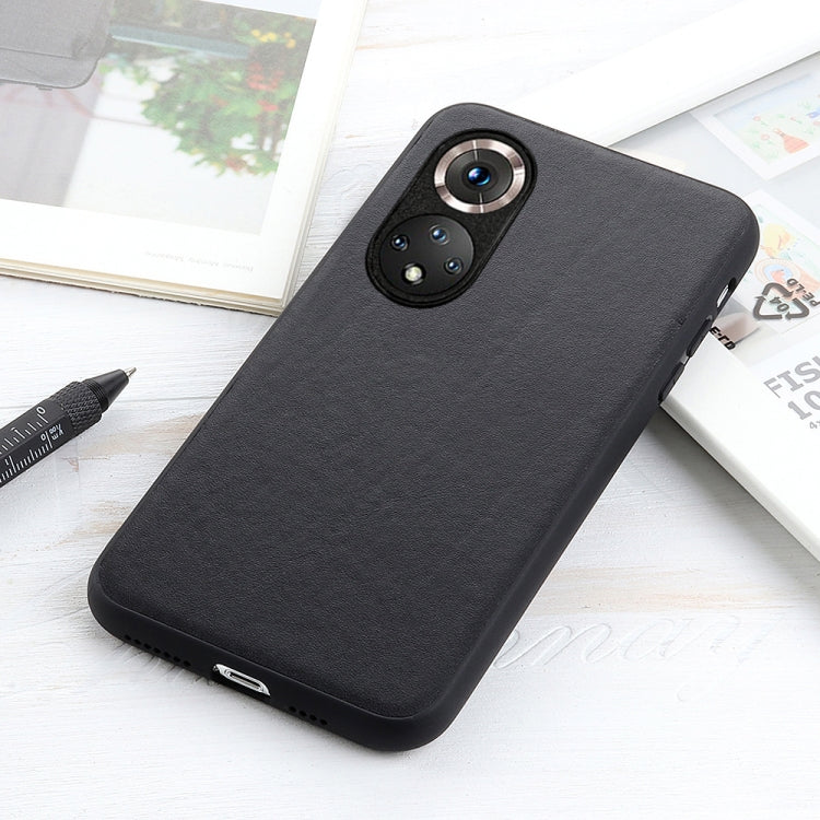 Black leather-texture phone case with dual camera cutout and bottom port openings