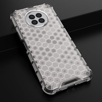 White shockproof honeycomb phone case with hex pattern and four-camera cutout.
