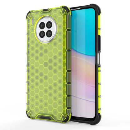 Green honeycomb shockproof phone case with neon TPU bumper, raised corners and camera cutouts.