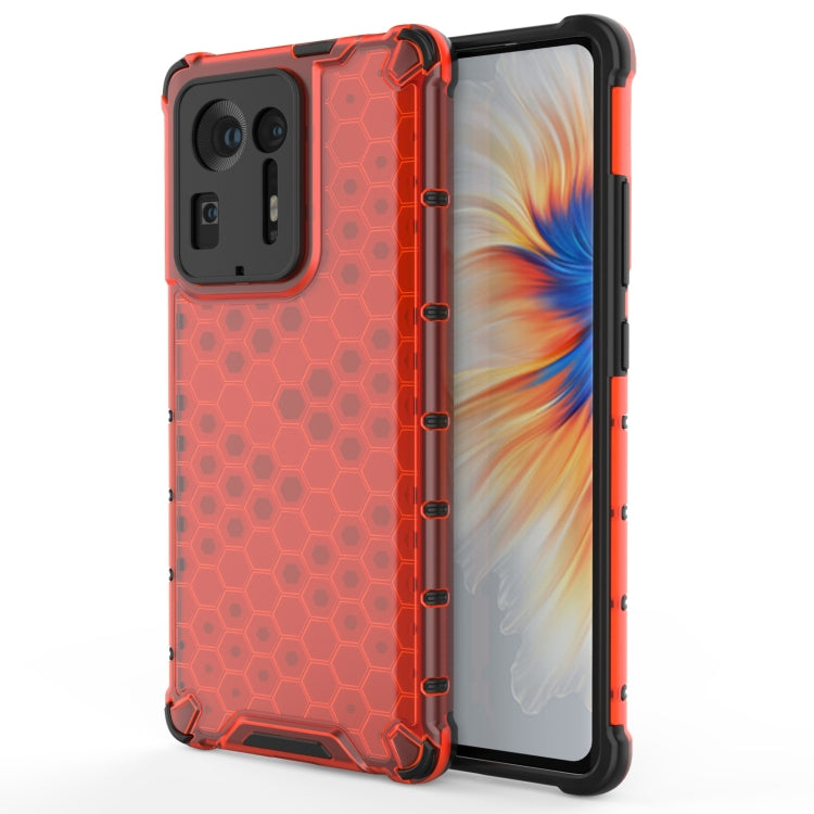 Shockproof honeycomb PC and TPU protective phone case with red hex pattern and black trim