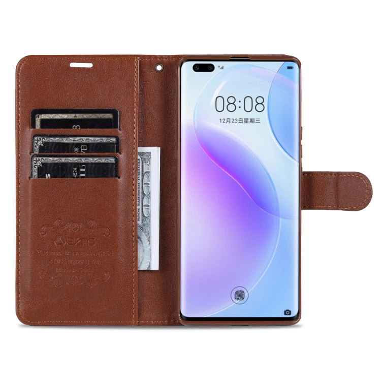 Brown flip leather wallet case with card slots and camera cutout; phone seated inside
