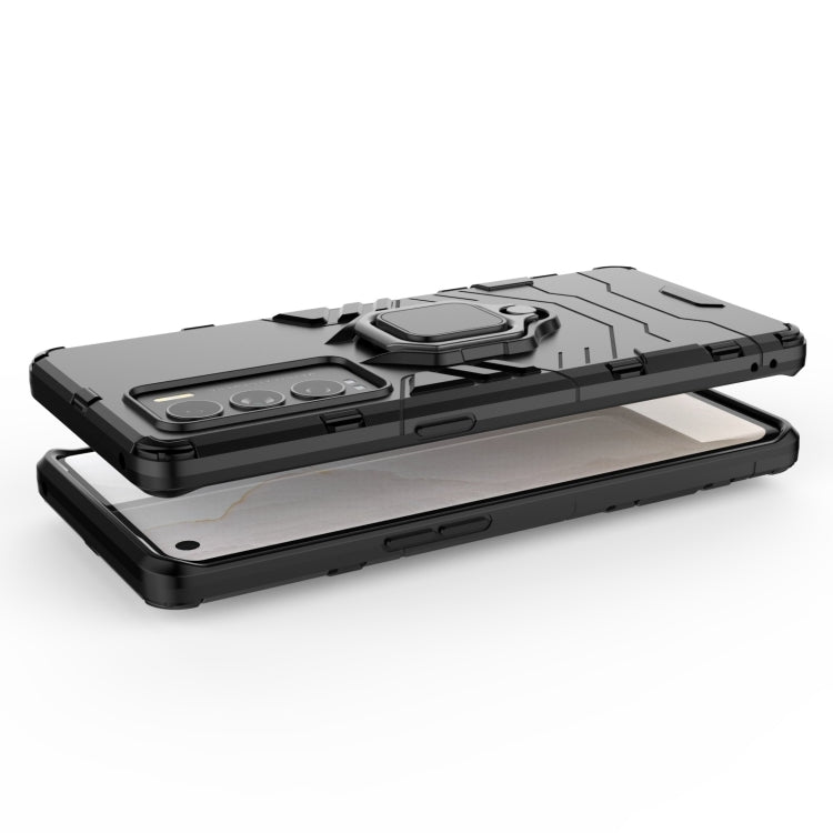 Rugged black phone case with magnetic ring holder; case lying flat, camera cover visible