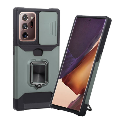 Protective phone case with sliding camera cover and ring holder, green and black.