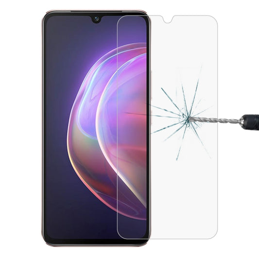 Tempered glass screen protector on smartphone screen with impact crack on the glass