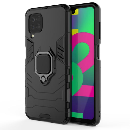 Black shockproof phone case with magnetic ring holder and raised camera protection