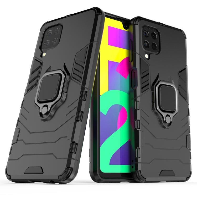 Black shockproof phone case with magnetic ring holder, protective edges and camera cutouts
