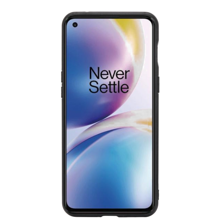 Black smartphone front with “Never Settle” screen display.
