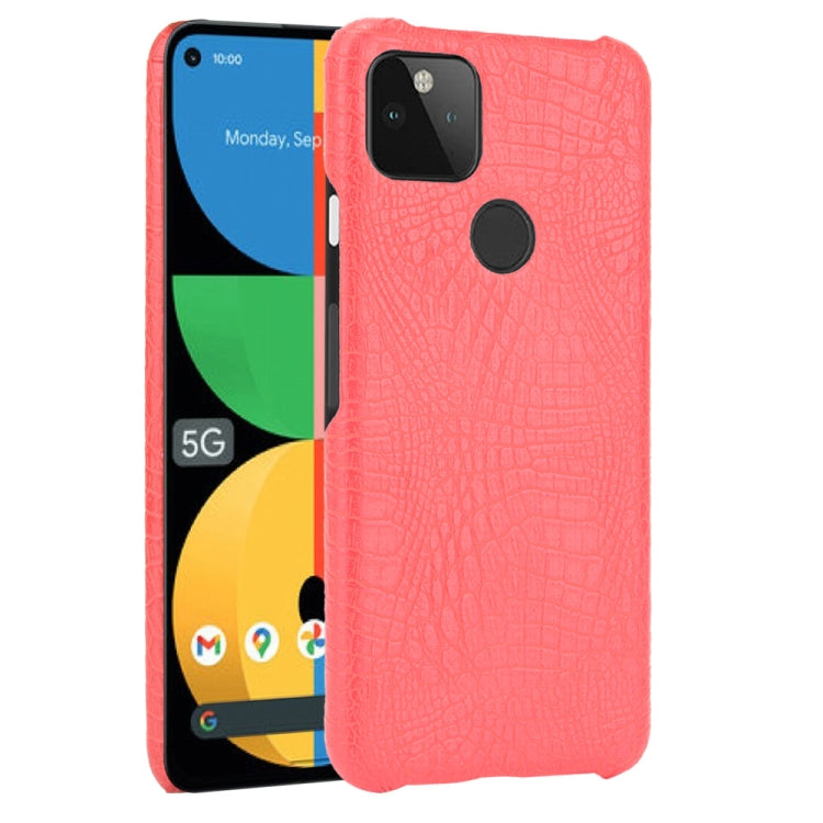 Shockproof crocodile-texture phone case, coral pink with raised camera area and textured finish