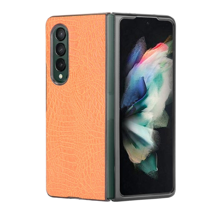 Shockproof crocodile-texture phone case in orange, with camera cutout and protective back panel