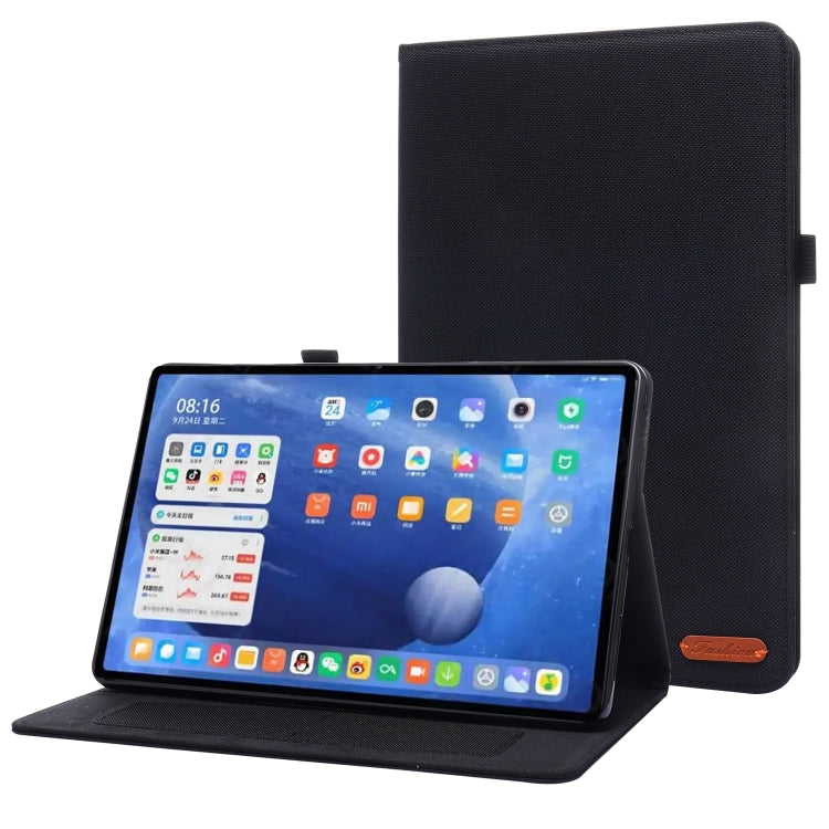 Black flip protective tablet case with stand, tablet screen facing forward.