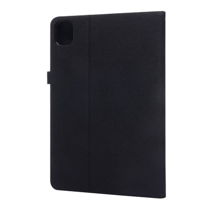Black flip tablet case with camera cutout on the back cover.
