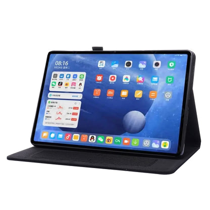 Black flip protective tablet case with kickstand for viewing, tablet in landscape.