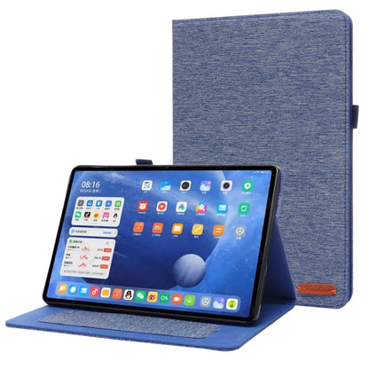 Dark blue textured flip tablet case with stand, tablet showing on screen.
