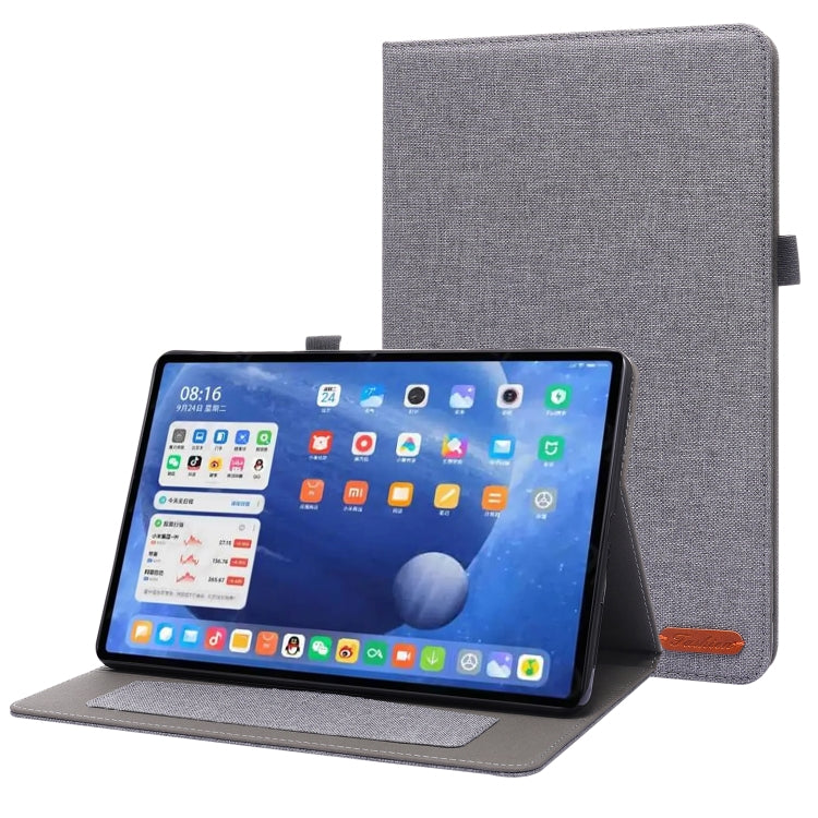 Grey textured flip tablet case with stand; tablet display facing forward.