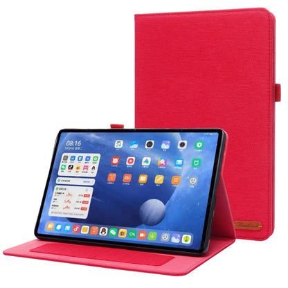 Red flip protective tablet case with stand; tablet screen facing forward.