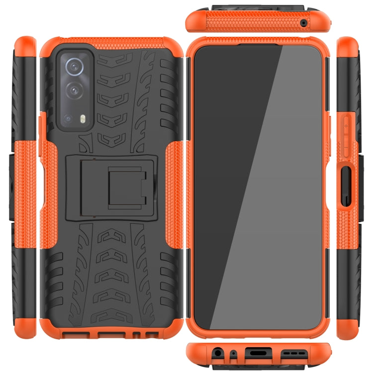 Pair view: rugged black and orange phone case with holder, plus front cover