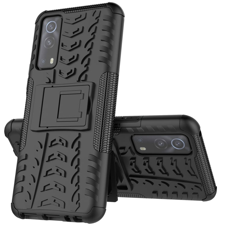 Black rugged phone case with textured grip and built-in holder for phone